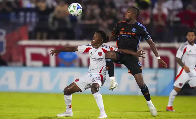 New York City FC midfielder Andrés Perea, right, grabs at FC Dallas midfielder Kaick while competing for the ball during the second half of an MLS soccer match Friday, July 25, 2025 in Frisco, Texas. (AP Photo/Julio Cortez)
