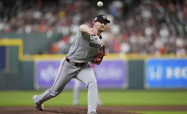 Washington Nationals starting pitcher Michael Soroka throws against the Houston Astros during the first inning of a baseball game Tuesday, July 29, 2025, in Houston. (AP Photo/David J. Phillip)