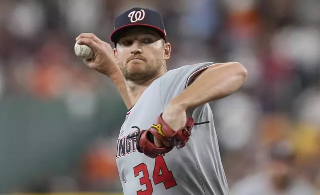 Washington Nationals starting pitcher Michael Soroka throws against the Houston Astros during the first inning of a baseball game Tuesday, July 29, 2025, in Houston. (AP Photo/David J. Phillip)