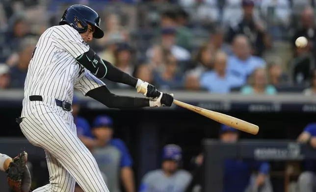 New York Yankees' Cody Bellinger hits a home run during the third inning of a baseball game against the Chicago Cubs, Friday, July 11, 2025, in New York. (AP Photo/Yuki Iwamura)