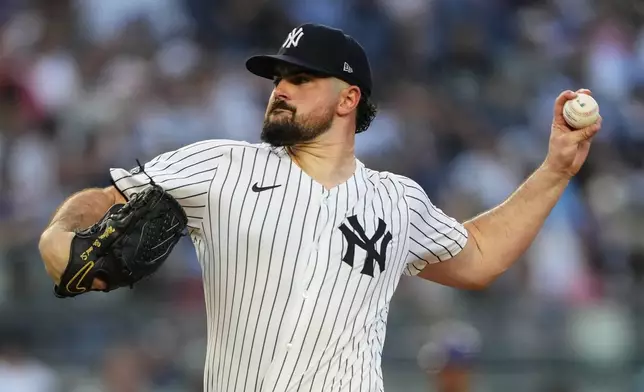 New York Yankees pitcher Carlos Rodón throws during the third inning of a baseball game against the Chicago Cubs, Friday, July 11, 2025, in New York. (AP Photo/Yuki Iwamura)