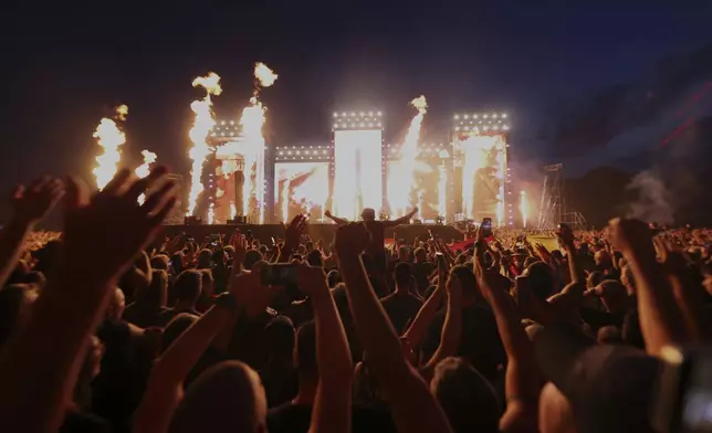 Thousands attend a concert by Marko Perkovic, the right-wing singer notorious for his perceived sympathy for Croatia's World War II pro-Nazi puppet regime, in Zagreb, Croatia, Saturday, July 5, 2025. (AP Photo)