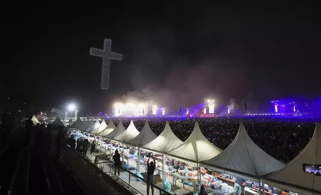 Thousands attend a concert by Marko Perkovic, the right-wing singer notorious for his perceived sympathy for Croatia's World War II pro-Nazi puppet regime, in Zagreb, Croatia, Saturday, July 5, 2025. (AP Photo)