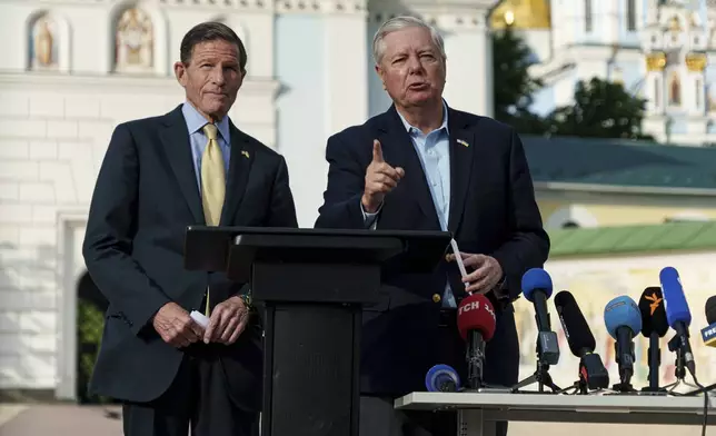 FILE - Sen. Richard Blumenthal, D-Conn., left, and Sen. Lindsey Graham, R-S.C., right, speak during a press conference in Kyiv, Ukraine, on May 30, 2025. (AP Photo/Vasilisa Stepanenko, File)