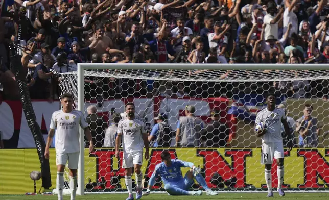 From left, Real Madrid's Federico Valverde, Dani Carvajal, Thibaut Courtois and Aurelien Tchouameni react after a goal by Paris Saint-Germain during the second half of a Club World Cup semifinal soccer match in East Rutherford, N.J., Wednesday, July 9, 2025. (AP Photo/Frank Franklin II)