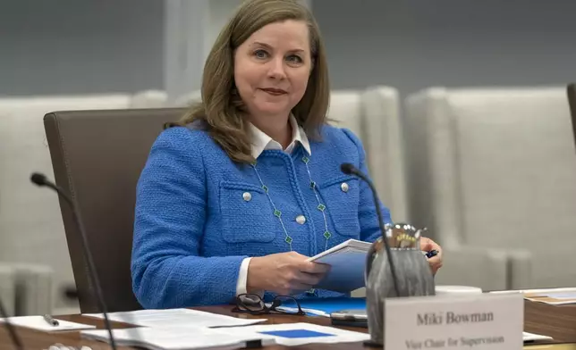 FILE - Michelle Bowman, Vice Chair for Supervision of the Federal Reserve Board of Governors, sits before an open meeting of the Board of Governors at the Federal Reserve, Wednesday, June 25, 2025, in Washington. (AP Photo/Mark Schiefelbein, File)