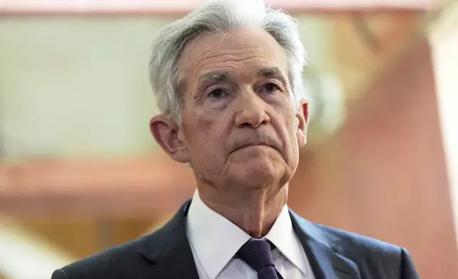 FILE - Federal Reserve Chairman Jerome Powell listens as President Donald Trump visits the Federal Reserve, Thursday, July 24, 2025, in Washington. (AP Photo/Julia Demaree Nikhinson, File)