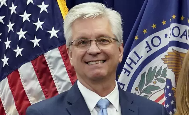 FILE - Federal Reserve Board of Governors member Christopher Waller poses for a photo on May 23, 2022, in Washington. (AP Photo/Patrick Semansky, File)