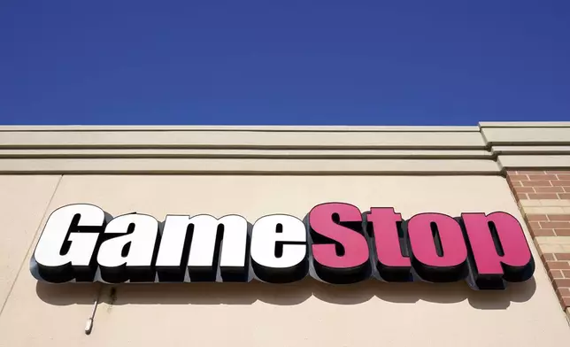 FILE - In this file photo, a GameStop sign is displayed above a store in Urbandale, Iowa, on Jan. 28, 2021. (AP Photo/Charlie Neibergall, File)