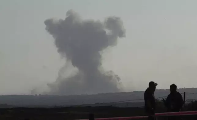 Smoke rises following an explosion in the Gaza Strip, as seen from southern Israel, Wednesday, July 30, 2025. (AP Photo/Ohad Zwigenberg)