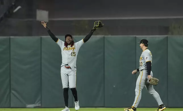 Pittsburgh Pirates center fielder Oneil Cruz (15) celebrates after the team's victory over the San Francisco Giants in a baseball game Tuesday, July 29, 2025, in San Francisco. (AP Photo/Godofredo A. Vásquez)