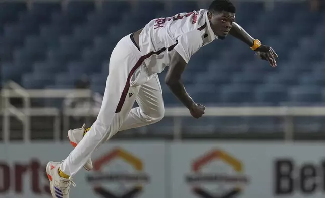 West Indies' Alzarri Joseph bowls against Australia on day two of the third Test cricket match at Sabina Park in Kingston, Jamaica, Sunday, July 13, 2025. (AP Photo/Ricardo Mazalan)