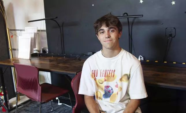 Bruce Perry, 17, poses for a portrait after discussing his use of artificial intelligence in school assignments and for personal questions Tuesday, July 15, 2025, in Russellville, Ark. (AP Photo/Katie Adkins)