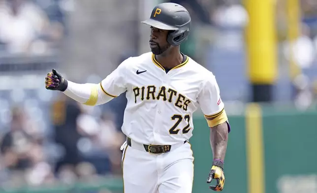 Pittsburgh Pirates' Andrew McCutchen rounds the bases after hitting a home run during the first inning of a baseball game against the Detroit Tigers, Wednesday, July 23, 2025, in Pittsburgh. (AP Photo/Matt Freed)
