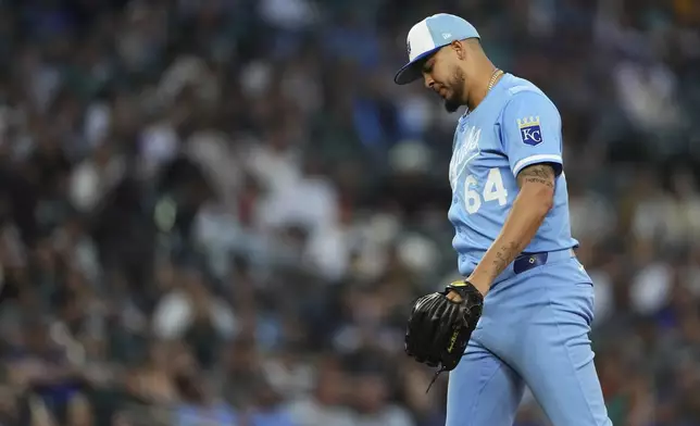 Kansas City Royals relief pitcher Steven Cruz walks off the field after the seventh inning of a baseball game against the Seattle Mariners, Wednesday, July 2, 2025, in Seattle. (AP Photo/Lindsey Wasson)