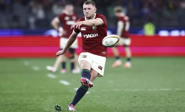 Finn Russell of the British &amp; Irish Lions takes a shot at goal during their rugby match against the Western Force in Perth, Australia, Saturday, June 28, 2025. (AP Photo/Trevor Collens)