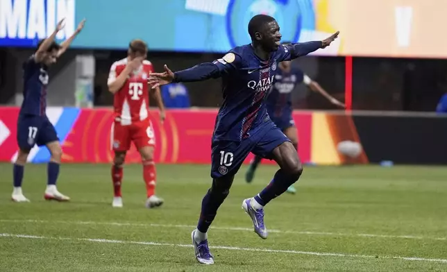 Paris Saint-Germain's Ousmane Dembele celebrates after scoring his team's second goal during the Club World Cup quarterfinal soccer match between PSG and Bayern Munich in Atlanta, Saturday, July 5, 2025. (AP Photo/Brynn Anderson)
