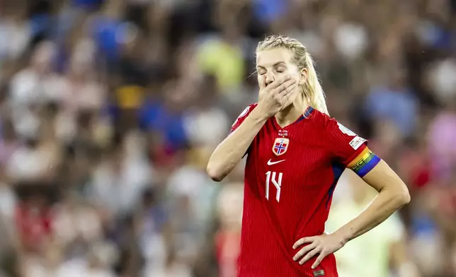 Norway's Ada Hegerberg reacts after missing a penalty shot against during the Women's Euro 2025 quarterfinals soccer match between Norway and Italy at Stade de Geneve in Geneva, Switzerland, Wednesday, July 16, 2025. (Jean-Christophe Bott/Keystone via AP)