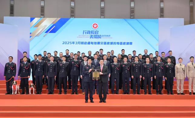 CE presents award certificates of Chief Executive's Award for Exemplary Performance to HKSAR Search and Rescue Team and Inter-departmental Preparation Team for Kai Tak Sports Park Commissioning  Source: HKSAR Government Press Releases