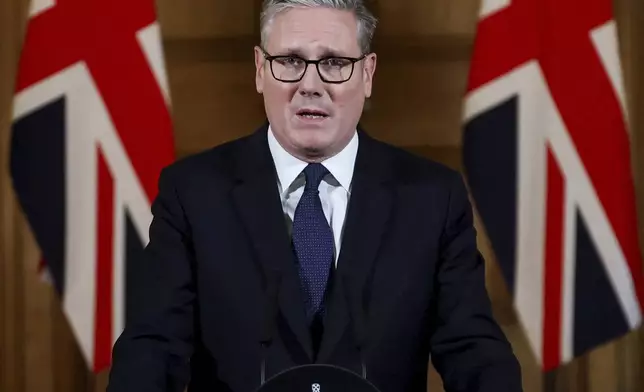 Britain's Prime Minister Keir Starmer delivers a statement inside No. 10 Downing Street on the day the cabinet was recalled to discuss the situation in Gaza, in London, Tuesday, July 29, 2025. (Toby Melville, Pool Photo via AP)