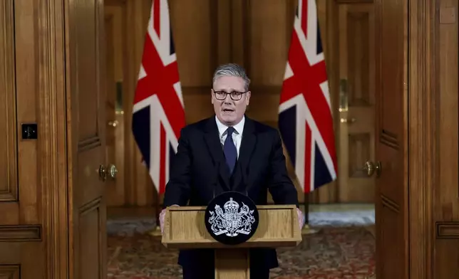 Britain's Prime Minister Keir Starmer delivers a statement inside No. 10 Downing Street on the day the cabinet was recalled to discuss the situation in Gaza, in London, Tuesday, July 29, 2025. (Toby Melville, Pool Photo via AP)