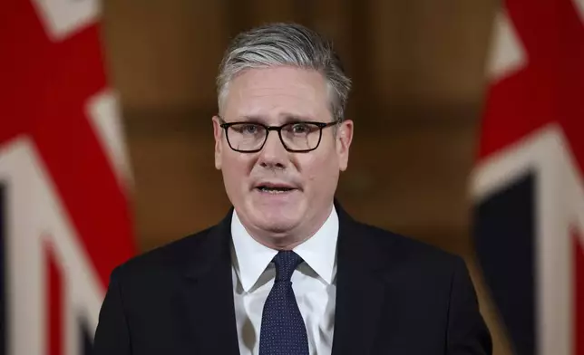 Britain's Prime Minister Keir Starmer delivers a statement inside No. 10 Downing Street on the day the cabinet was recalled to discuss the situation in Gaza, in London, Tuesday, July 29, 2025. (Toby Melville, Pool Photo via AP)