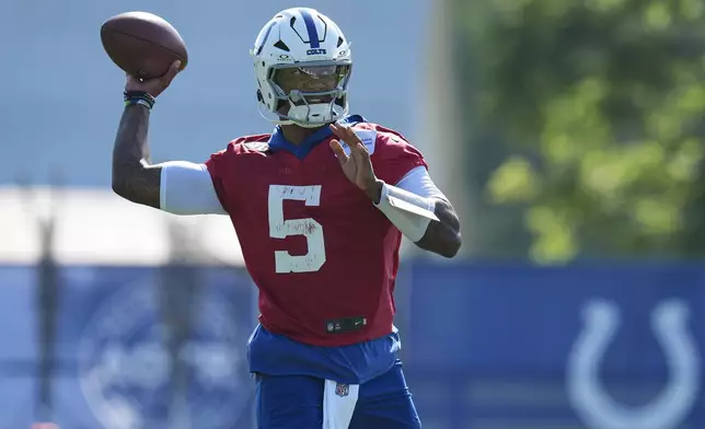 Indianapolis Colts quarterback Anthony Richardson Sr. (5) throws during practice at the NFL football team's training camp in Westfield, Ind., Wednesday, July 23, 2025. (AP Photo/Michael Conroy)