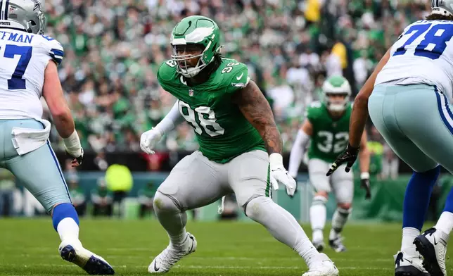 FILE - Philadelphia Eagles defensive tackle Jalen Carter (98) in action during the first half of an NFL football game against the Dallas Cowboys, Sunday, Dec. 29, 2024, in Philadelphia. (AP Photo/Terrance Williams, File)