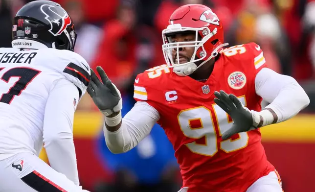 FILE - Kansas City Chiefs defensive tackle Chris Jones (95) rushes against Houston Texans offensive tackle Blake Fisher (57) during the first half of an NFL football divisional playoff game, Saturday, Jan. 18, 2025 in Kansas City, Mo. (AP Photo/Reed Hoffmann, File)
