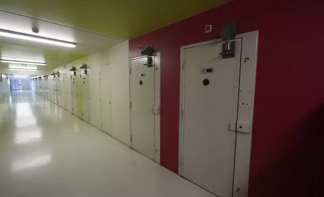 FILE - A corridor in the Vendin-le-Vieil prison, northern France, May 14, 2025. (AP Photo/Michel Euler, Pool, File)