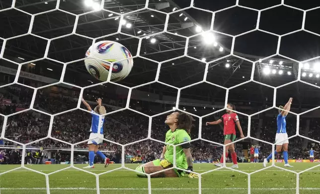 Portugal goalkeeper Patricia Morais reacts after Italy's Cristiana Girelli scored the opening goal during the Euro 2025, group B, soccer match between Portugal and Italy at Stade de Geneve in Geneva, Switzerland, Monday, July 7, 2025. (AP Photo/Alessandra Tarantino)