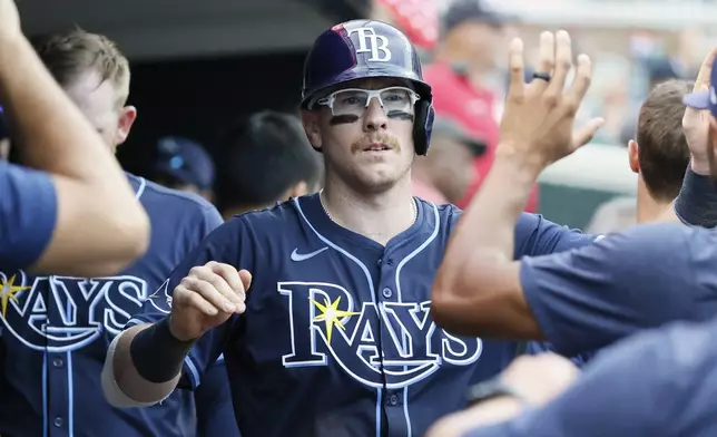 Tampa Bay Rays' Danny Jansen celebrates after scoring against the Detroit Tigers during the sixth inning of a baseball game Wednesday, July 9, 2025, in Detroit. (AP Photo/Duane Burleson)
