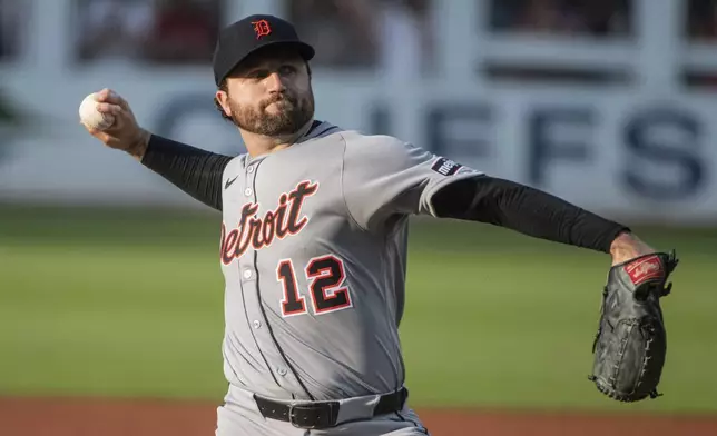 Detroit Tigers starting pitcher Casey Mize delivers against the Cleveland Guardians during the first inning of a baseball game, Saturday, July 5, 2025, in Cleveland. (AP Photo/Phil Long)