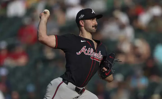 Atlanta Braves pitcher Spencer Strider throws to an Athletics batter during the first inning of a baseball game Thursday, July 10, 2025, in West Sacramento, Calif. (AP Photo/Scott Marshall)