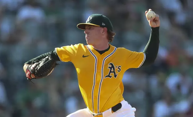 Athletics pitcher JP Sears throws to an Atlanta Braves batter during the first inning of a baseball game Thursday, July 10, 2025, in West Sacramento, Calif. (AP Photo/Scott Marshall)