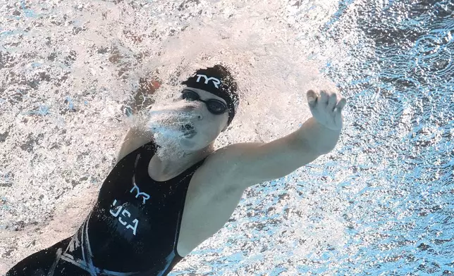 Katie Ledecky of the United States competes in the women's 1500m freestyle final at the World Aquatics Championships in Singapore, Tuesday, July 29, 2025. (AP Photo/Lee Jin-man)
