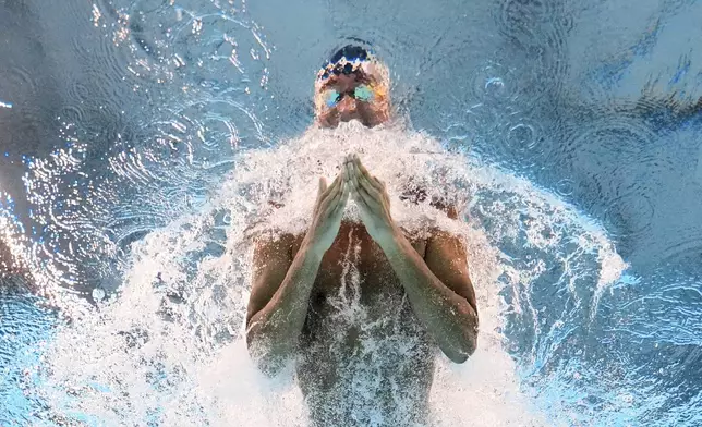 Leo Nzimbi of Central African Republic competes in the men's 50-meter breaststroke heats at the World Aquatics Championships in Singapore, Tuesday, July 29, 2025. (AP Photo/Lee Jin-man)