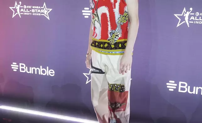 Dallas Wings' Paige Bueckers poses on the orange carpet for WNBA All Star basketball events, Thursday, July 17, 2025, in Indianapolis. (AP Photo/Darron Cummings)
