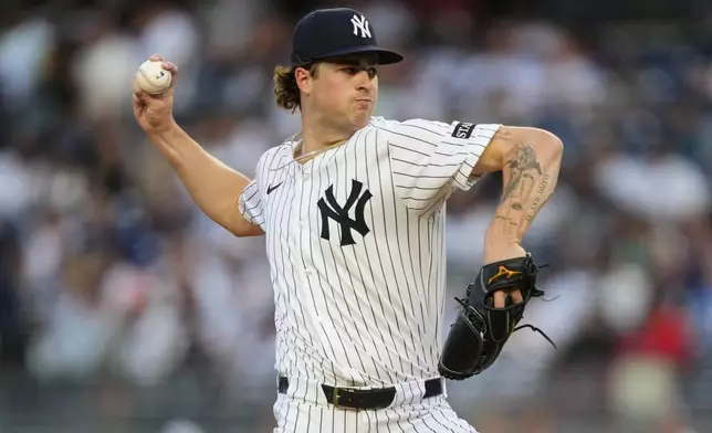 New York Yankees pitcher Cam Schlittler (31) throws during the first inning of a baseball game against the Seattle Mariners, Wednesday, July 9, 2025, in New York. (AP Photo/Yuki Iwamura)