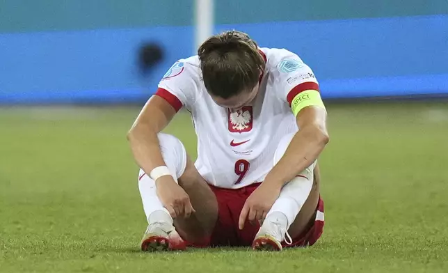 Poland's Ewa Pajor reacts at the end of the Euro 2025, group C, soccer match between Poland and Sweden at Allmend Stadion Luzern in Lucerne, Switzerland, Tuesday, July 8, 2025. (AP Photo/Alessandra Tarantino)