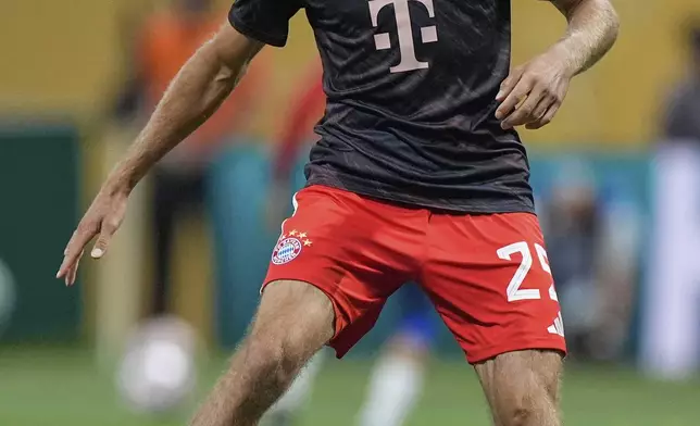 Bayern Munich's Thomas Muller warms up before the Club World Cup quarterfinal soccer match between PSG and Bayern Munich in Atlanta, Saturday, July 5, 2025. (AP Photo/Mike Stewart)