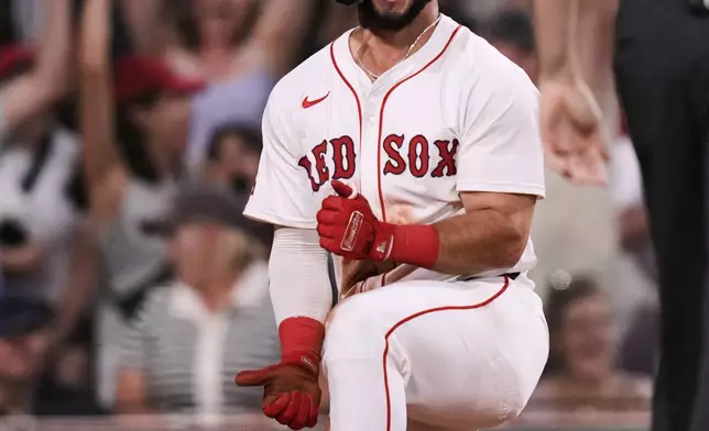 Boston Red Sox's Wilyer Abreu celebrates after his inside-the-park home run off Cincinnati Reds pitcher Joe LaSorsa during the fifth inning of a baseball game at Fenway Park, Monday, June 30, 2025, in Boston. (AP Photo/Charles Krupa)