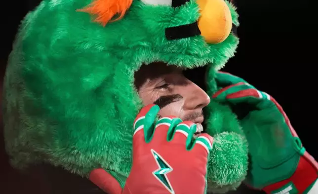 Boston Red Sox's Jarren Duran celebrates after his solo home run in the sixth inning of a baseball game against the Cincinnati Reds at Fenway Park, Monday, June 30, 2025, in Boston. (AP Photo/Charles Krupa)