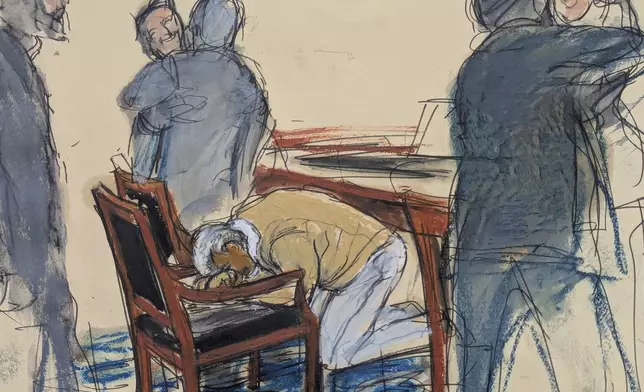 Sean "Diddy" Combs reacts after he was convicted of prostitution-related offenses but acquitted of sex trafficking and racketeering charges that could have put him behind bars for life, Wednesday, July 2, 2025, in Manhattan federal court in New York. (Elizabeth Williams via AP)