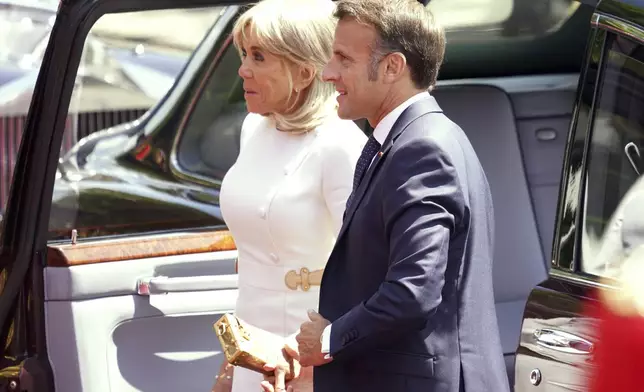 French President Emmanuel Macron and his wife Brigitte arrive at Windsor Castle to be welcomed by Britain's King Charles III and Queen Camilla in Windsor, England, Tuesday, July 8, 2025.(AP Photo/Alberto Pezzali, Pool)