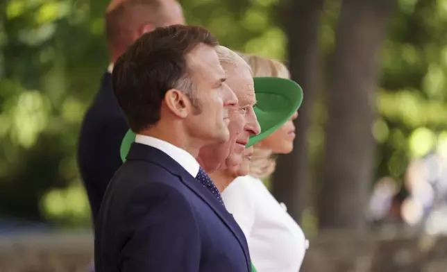 Britain's King Charles III and Queen Camilla welcome French President Emmanuel Macron and his wife Brigitte to Windsor Castle in Windsor, England, Tuesday, July 8, 2025.(AP Photo/Alberto Pezzali, Pool)