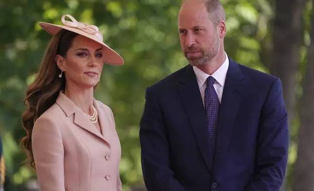Britain's Kate, Princess of Wales and Prince William join Britain's King Charles III and Queen Camilla to welcome French President Emmanuel Macron and his wife Brigitte to Windsor Castle in Windsor, England, Tuesday, July 8, 2025.(AP Photo/Alberto Pezzali, Pool)