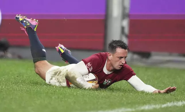 Alex Mitchell of the British &amp; Irish Lions scores a try during the Lions and Waratahs rugby match in Sydney, Australia, Saturday, July 5, 2025. (AP Photo/Mark Baker)