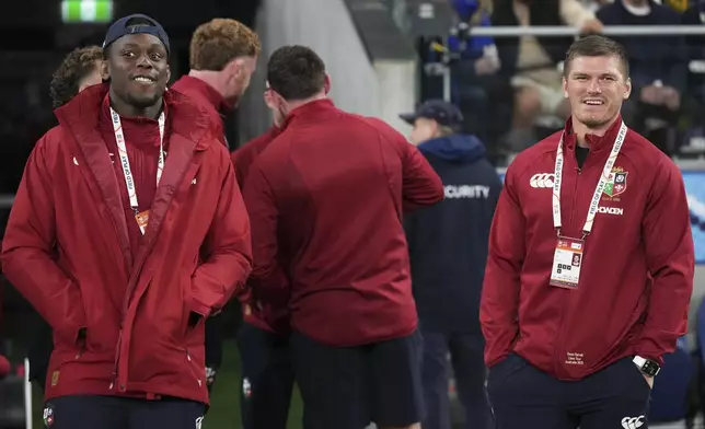 Maro Itoje, left, of the British &amp; Irish Lions stands with teammate Owen Farrell, right, following the Lions and Waratahs rugby match in Sydney, Australia, Saturday, July 5, 2025. (AP Photo/Mark Baker)
