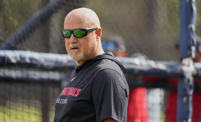 FILE - Washington Nationals general manager Mike Rizzo watches during a spring training baseball practice Tuesday, Feb. 18, 2025, in West Palm Beach, Fla. (AP Photo/Jeff Roberson, File)